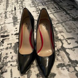 Black pointed toe heels